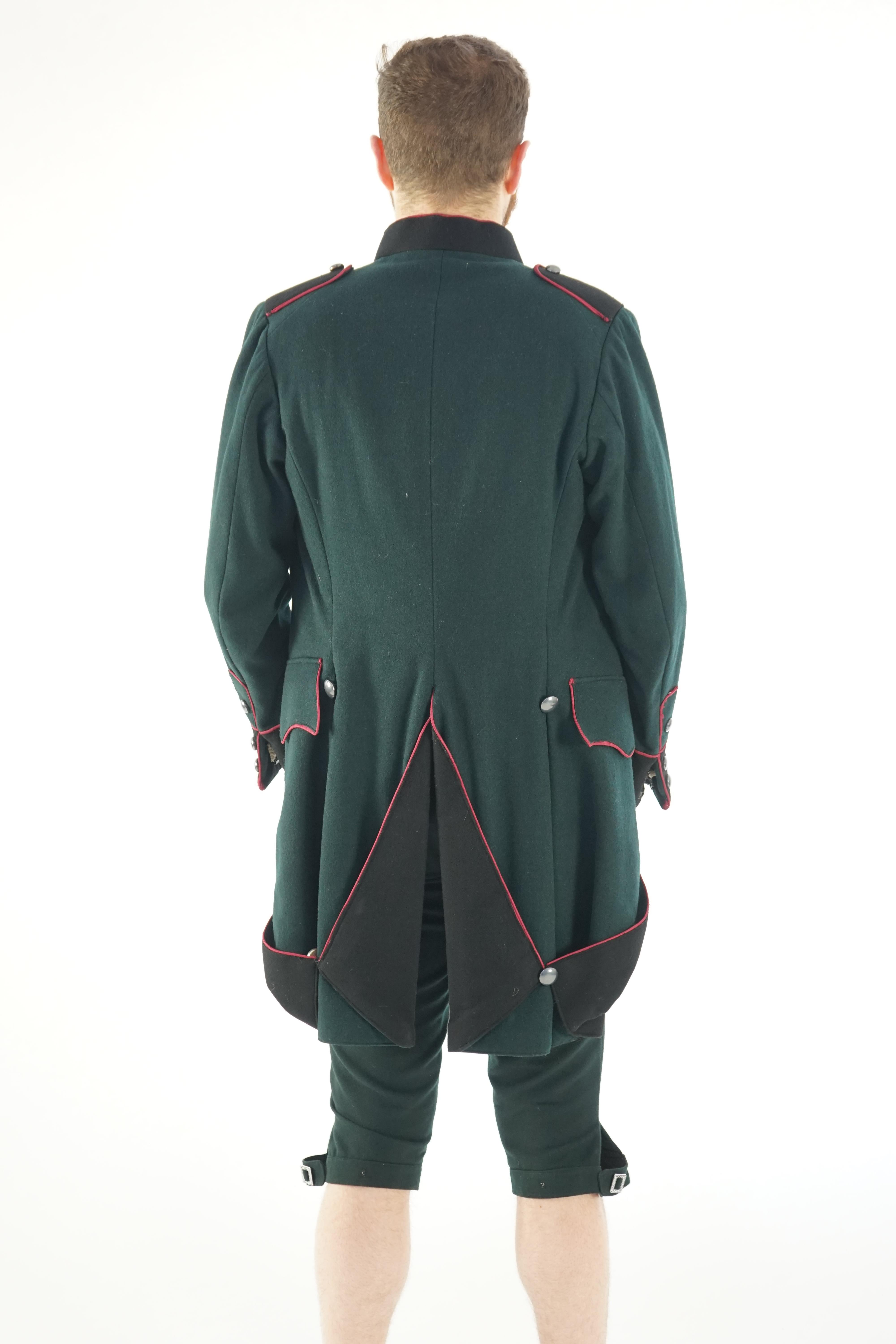 A dark green and black 18th Century style military uniform (jacket, waistcoat and breeches). Ex Royal Opera House - Soldier 'The Barber of Seville' 1993